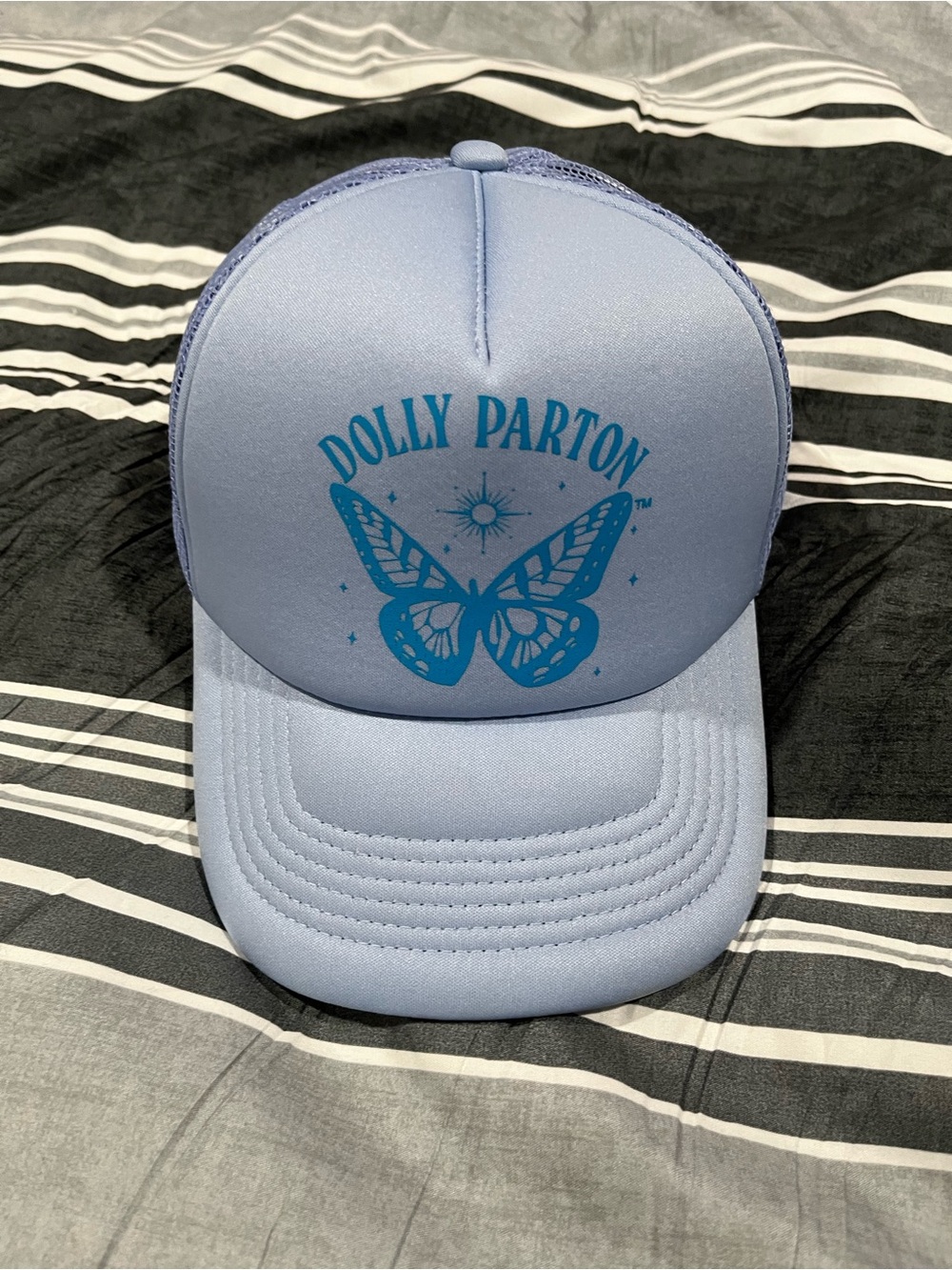 Dolly Parton Light Blue Trucker Hat with Butterfly Graphic
